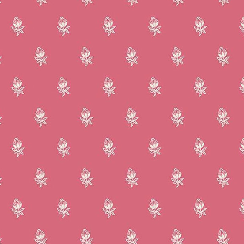 Pink fabric with ornate white flowers. 