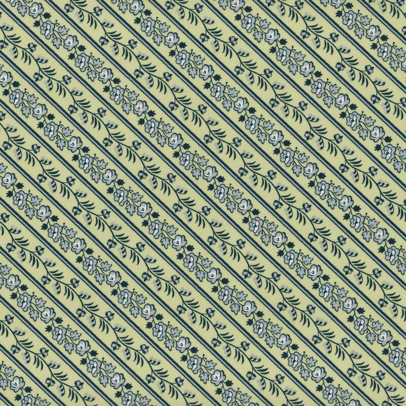 Sage green fabric with dusty blue diagonal stripes of flowers and vines.