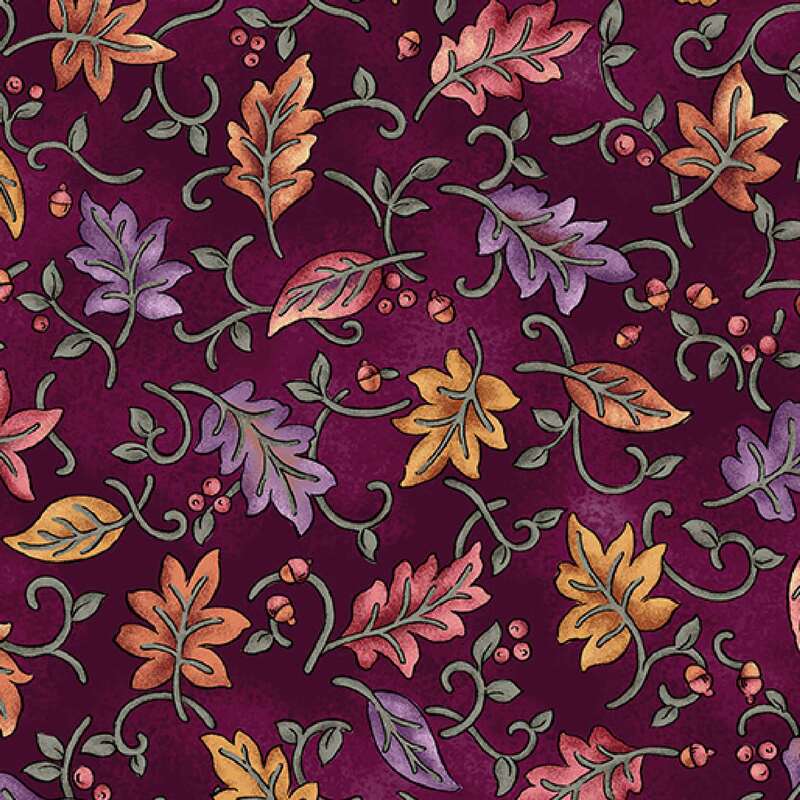 A rich purple fabric featuring a decorative pattern of colorful autumn leaves and swirls.