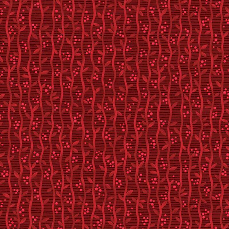 Red patterned fabric featuring wavy stripes and small dots on a rich red background.