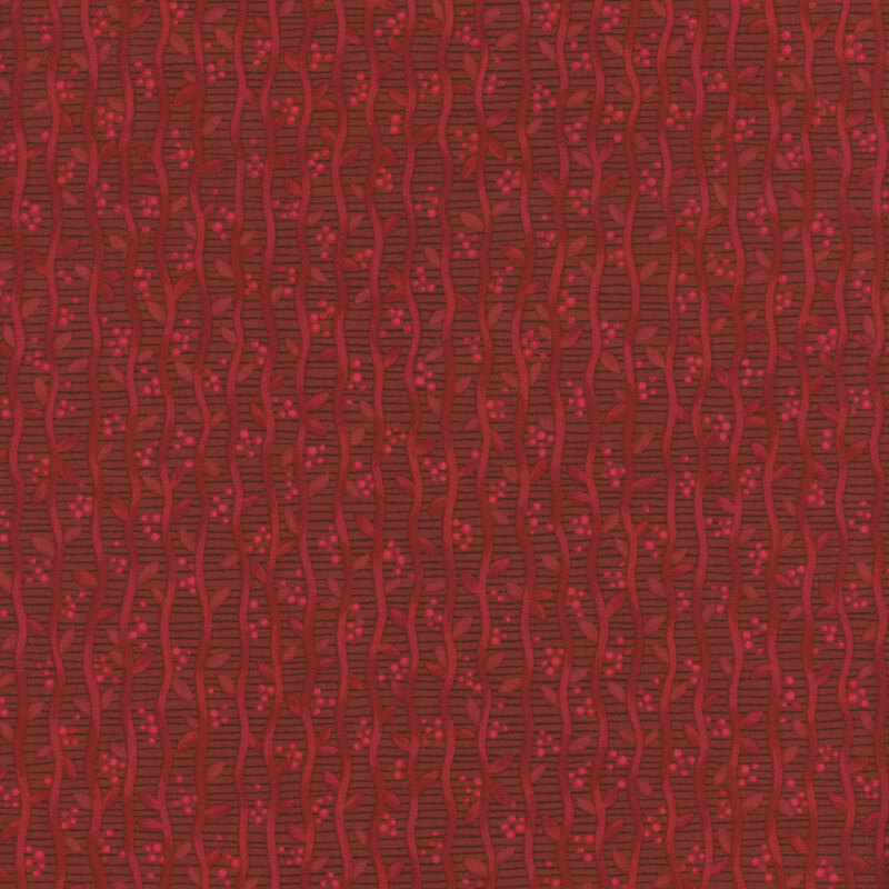 Red patterned fabric featuring wavy stripes and small dots on a rich red background.