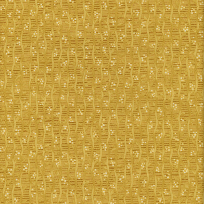 Golden patterned fabric featuring wavy stripes and small, dotted details.