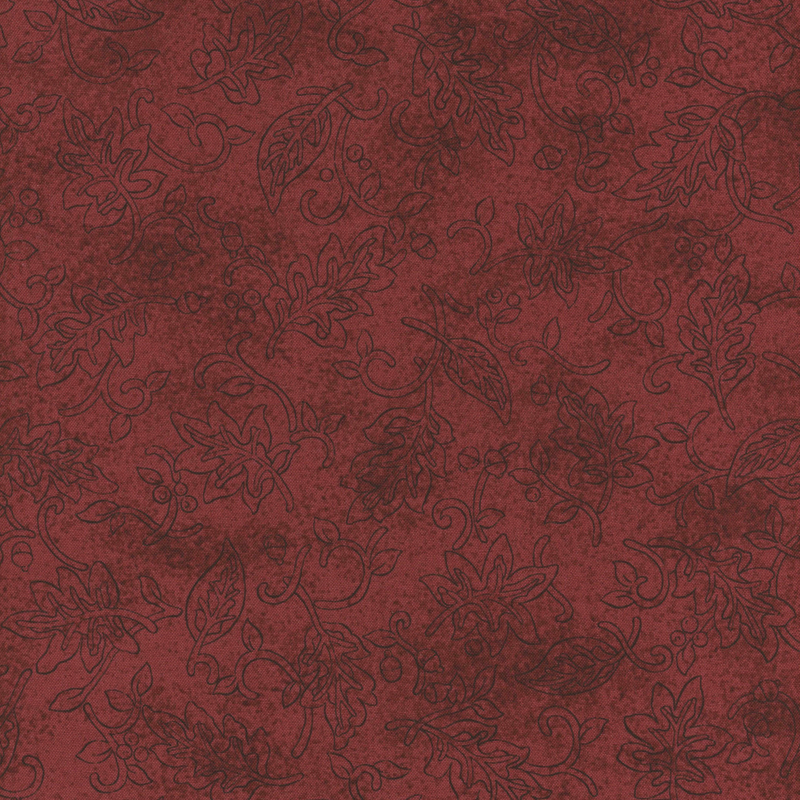 Textured burgundy fabric featuring subtle floral and leaf patterns.