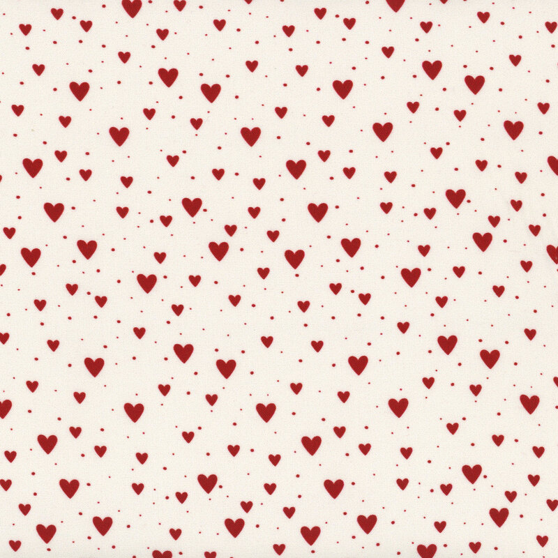 Cream fabric with red hearts and dots of varying sizes.