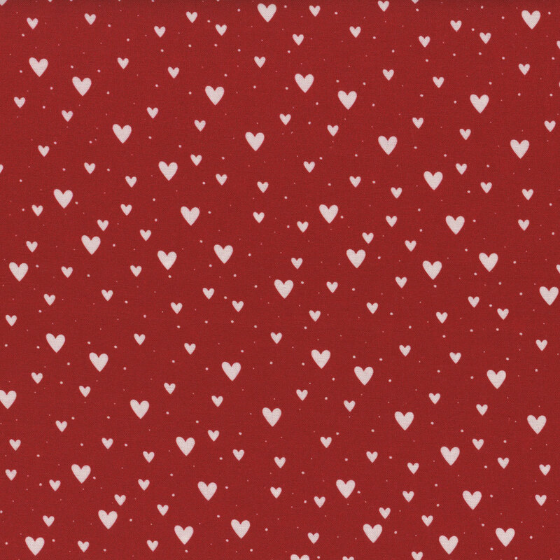 Red fabric with white hearts and dots of varying sizes.