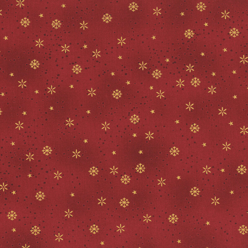 Mottled red fabric with gold metallic snowflakes.