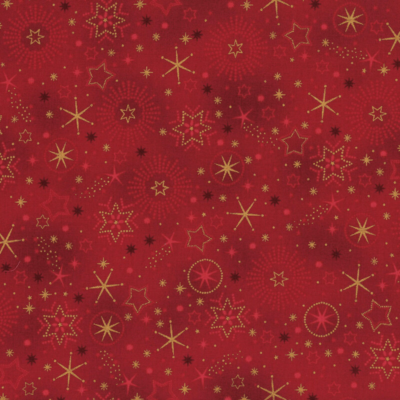 Mottled maroon fabric with gold metallic stars and snowflakes.