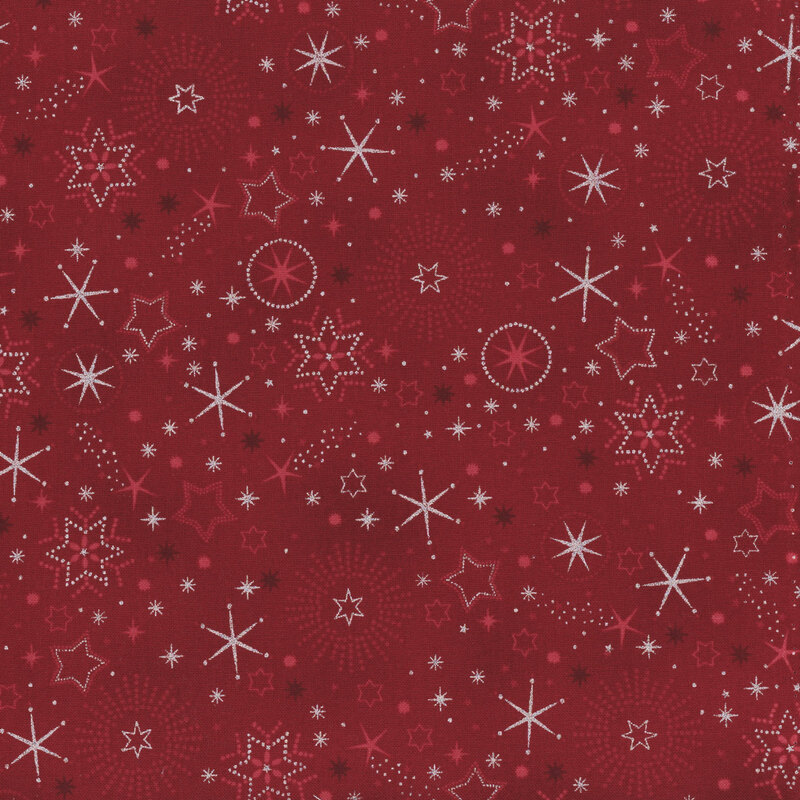 Red fabric with tonal and silver metallic stars and snowflakes.