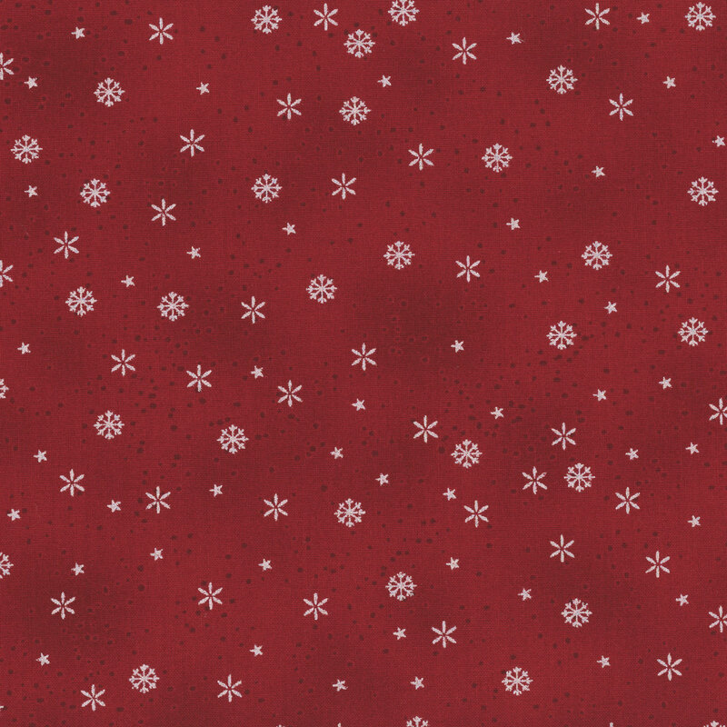 Mottled red fabric with small silver metallic snowflakes.