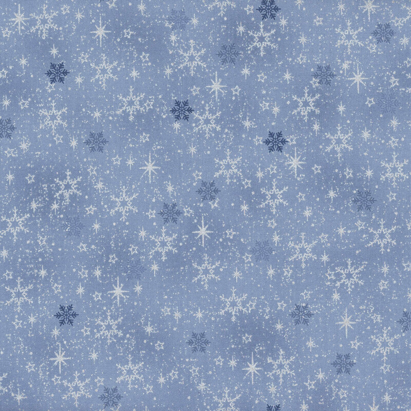 Mottled light blue fabric with tonal and silver metallic snowflakes.