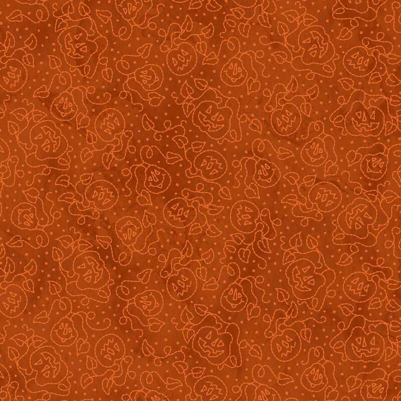 A textured orange fabric featuring a playful pattern of abstract smiling faces and doodles.