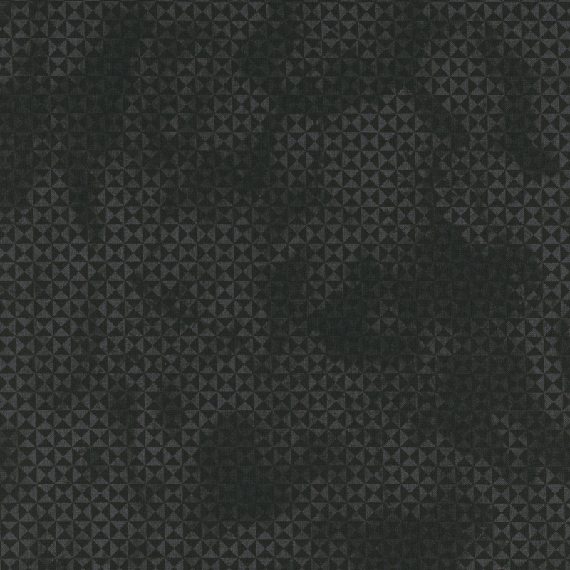 Black textured pattern featuring small, raised triangular shapes arranged in a grid.