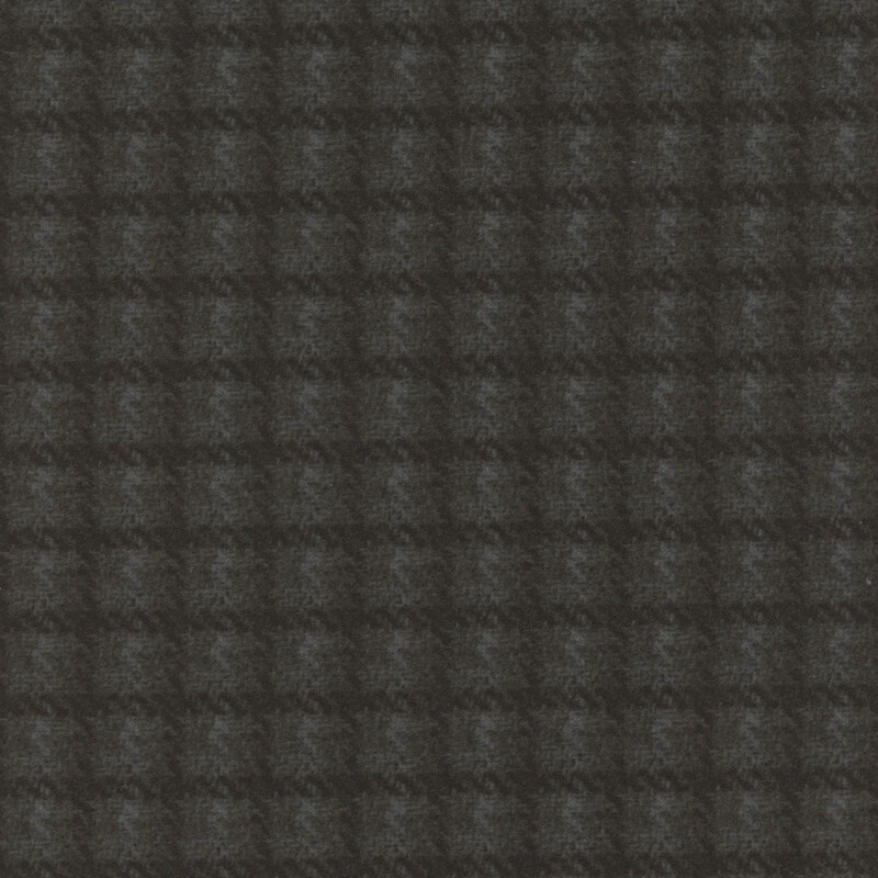 Textured pattern of dark gray and black squares arranged in a grid formation.