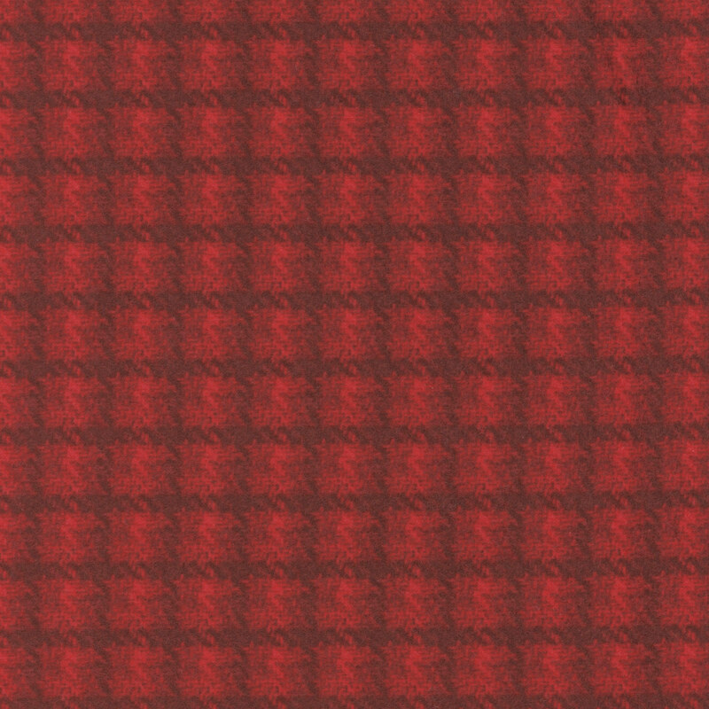Red fabric with a grid pattern, showcasing a subtle variation in shades and depth.
