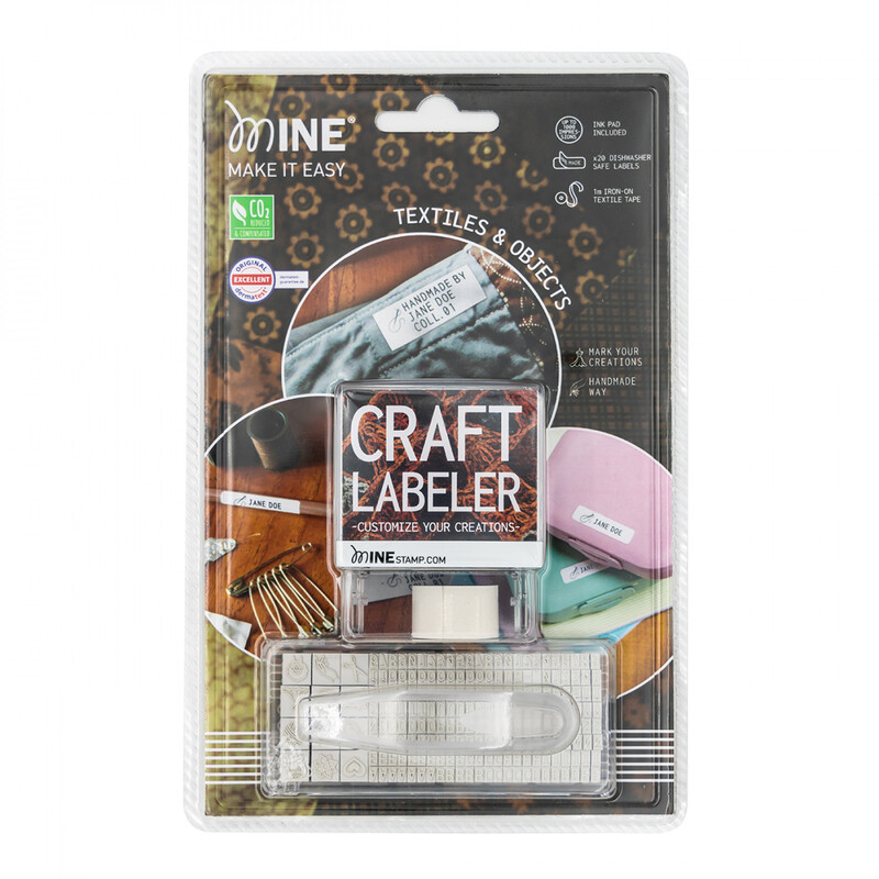 The front of the Colop Craft Labeler packaging, showing the stamp, tweezers, and interchangeable letters and numbers.