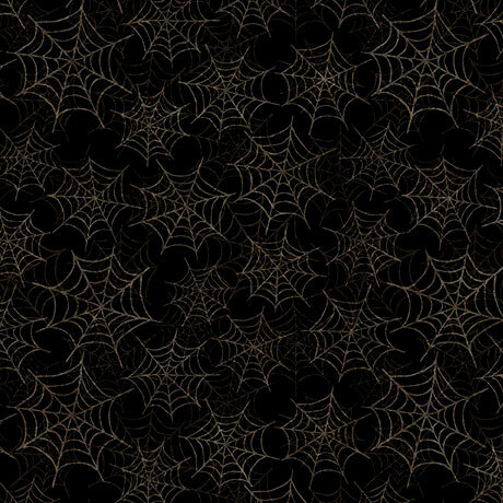 Black fabric featuring a spiderweb design