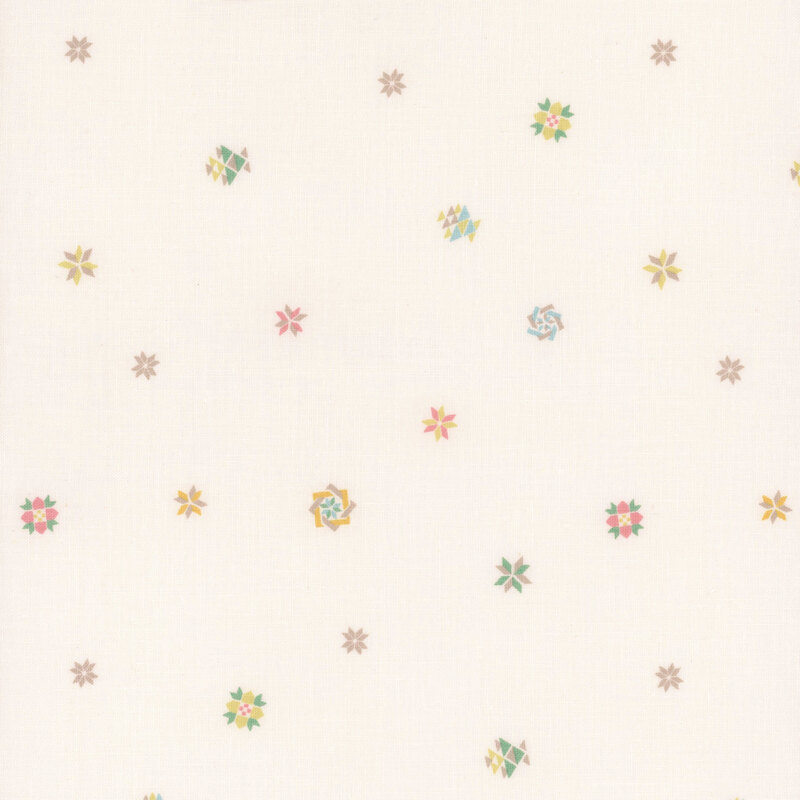 Pattern of small, colorful quilt block shapes on a cream background.