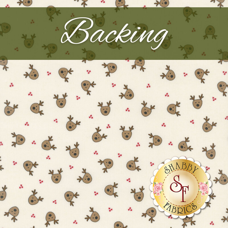 Swatch of cream fabric with tossed red dots and brown reindeer heads. A green banner at the top reads 