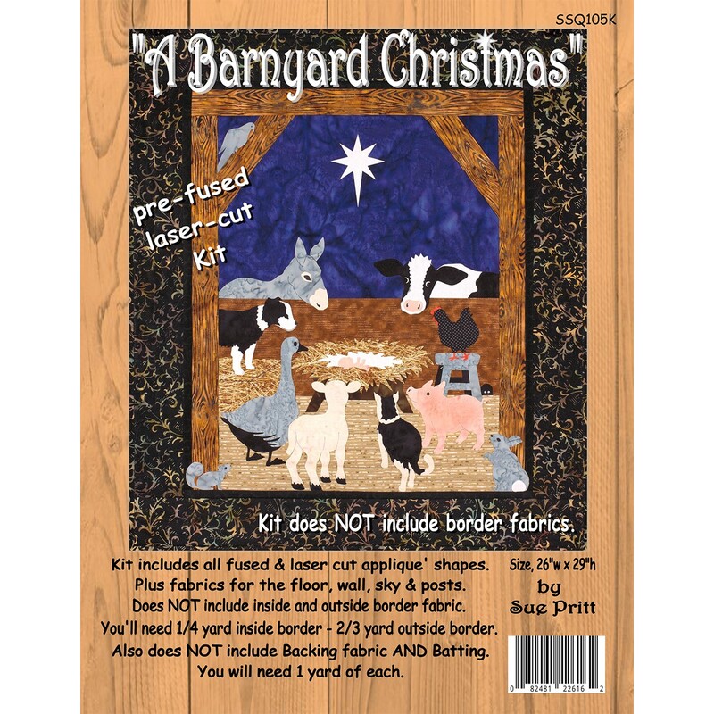 Barnyard Christmas quilt kit cover with animals around a manger scene.