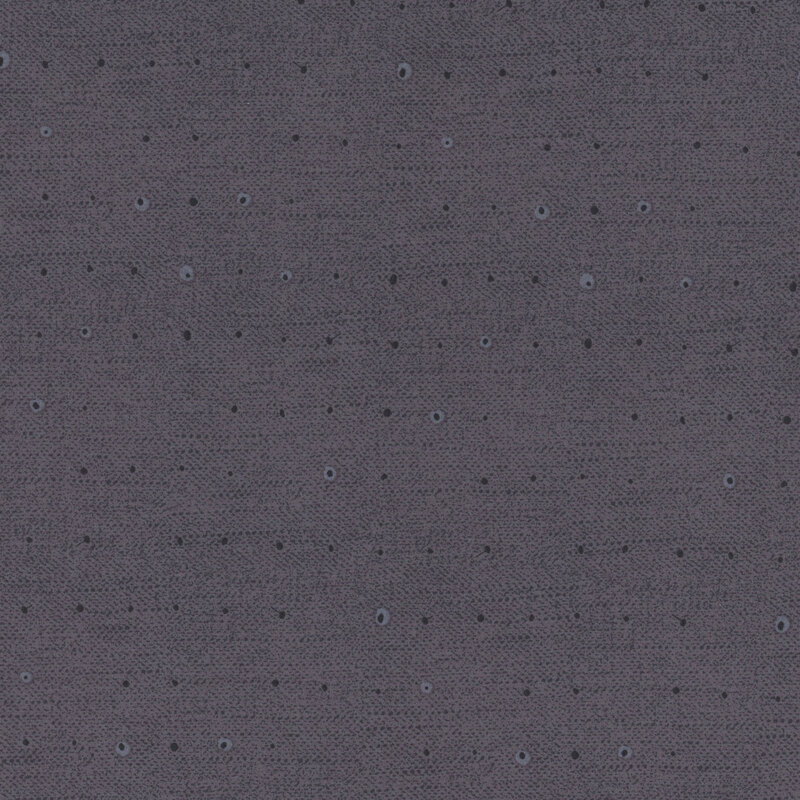 Tonal dots on a lightly textured denim blue background.