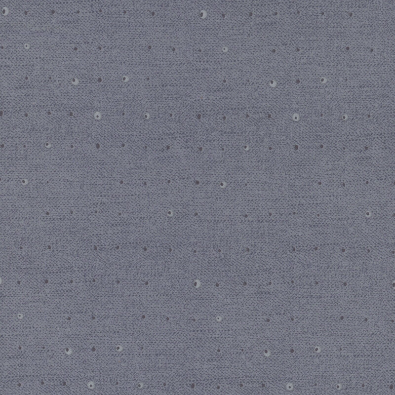 Tonal dots on a lightly textured denim blue background.