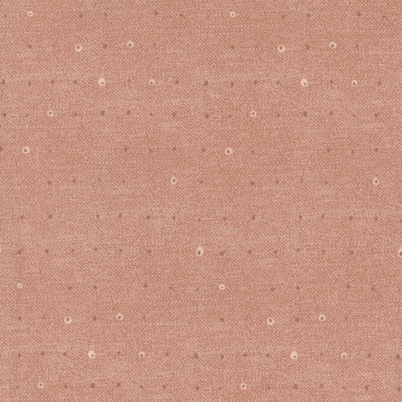 Tonal dots on a lightly textured light peach background.