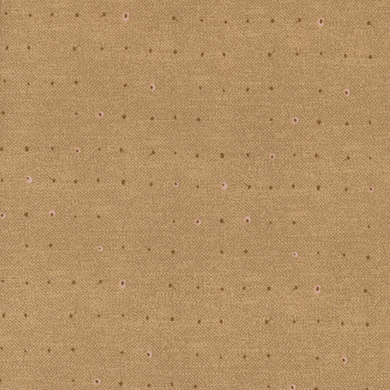 Tonal dots on a lightly textured camel brown background.