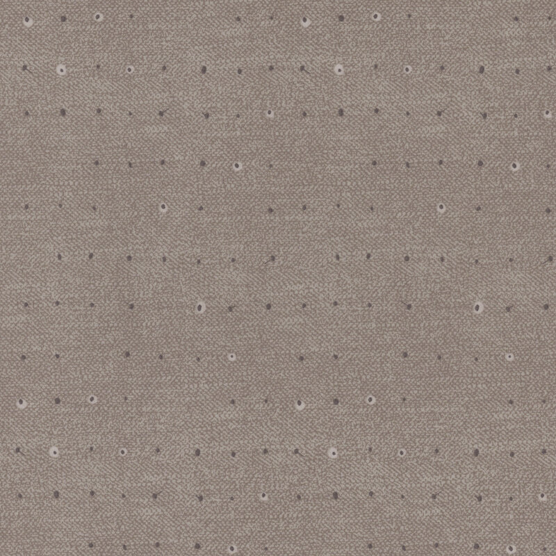 Tonal dots on a lightly textured mushroom gray background.