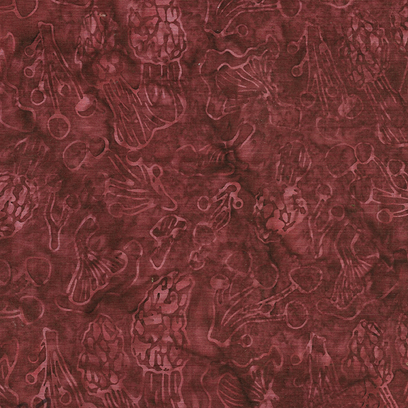 A red fabric featuring an abstract pattern of various organic shapes.