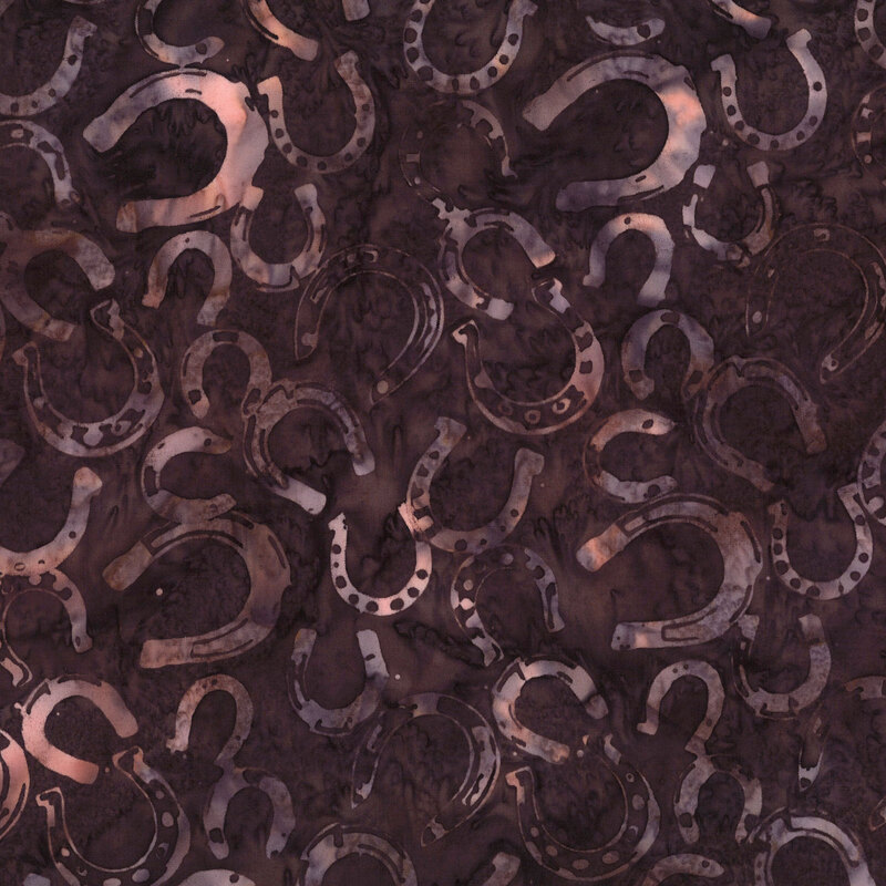 Pattern of overlapping horseshoes in a dark, textured background.