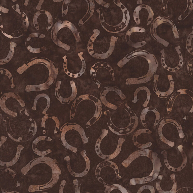 Pattern of overlapping horseshoes in a dark, textured background.