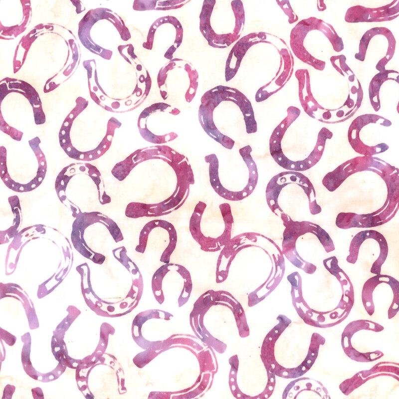 A repeating pattern of colorful horseshoes in shades of purple and pink on a light background.