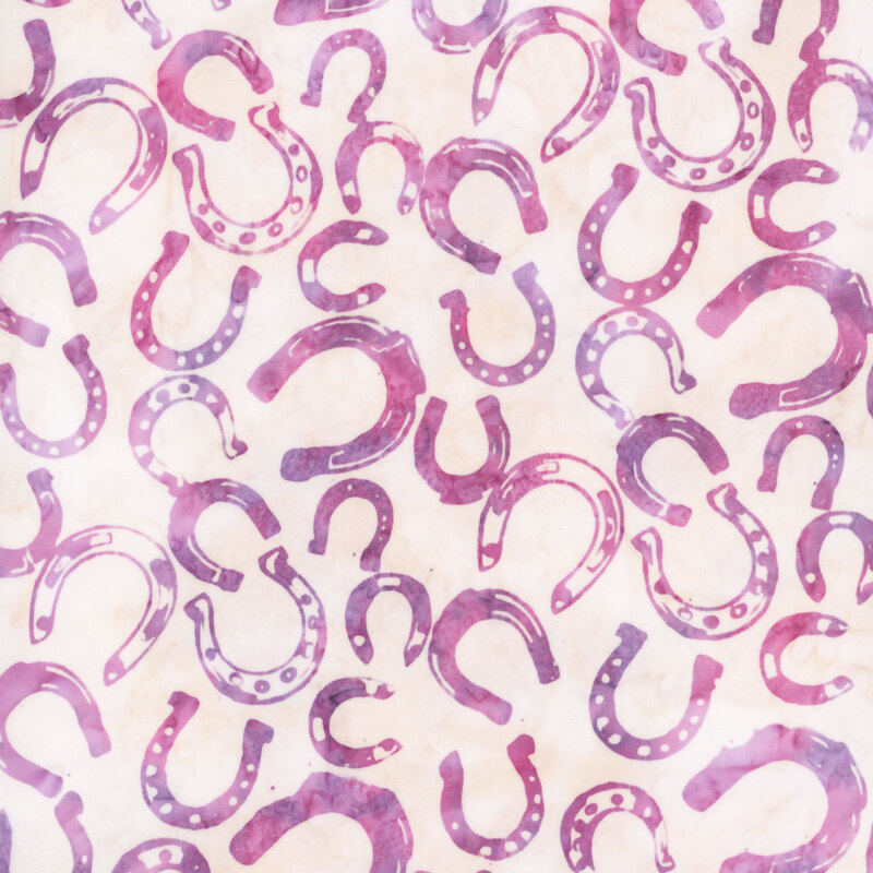 A repeating pattern of colorful horseshoes in shades of purple and pink on a light background.