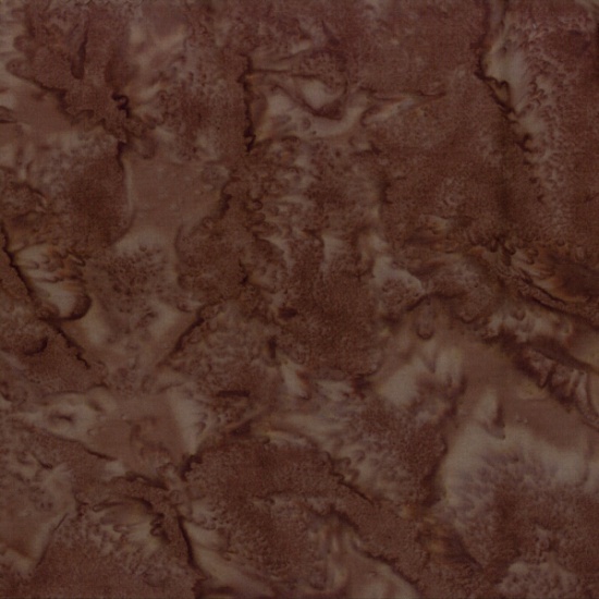 Brown marbled fabic with subtle variations and swirls throughout the surface.