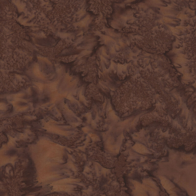 Brown marbled fabic with subtle variations and swirls throughout the surface.