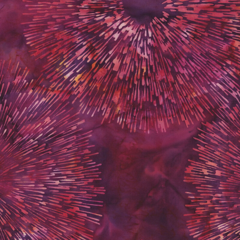 Abstract fabric pattern with pink and purple bursts radiating from the center, set against a darker background.