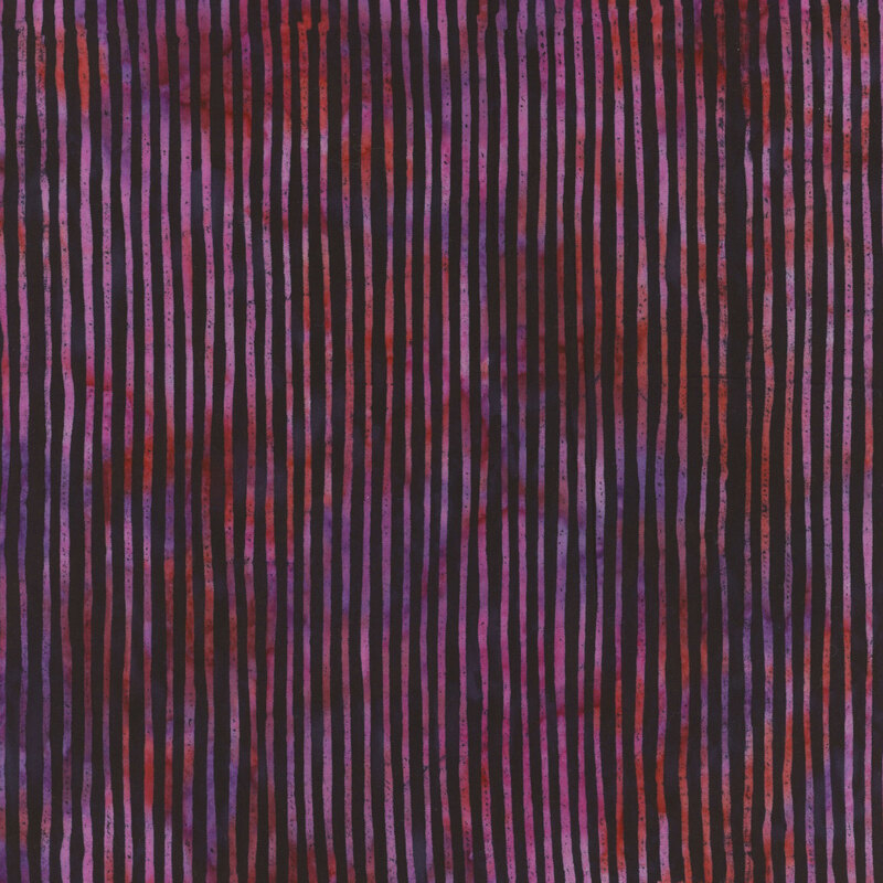 Abstract fabric pattern featuring vertical stripes in shades of red, purple, and black on a textured background.