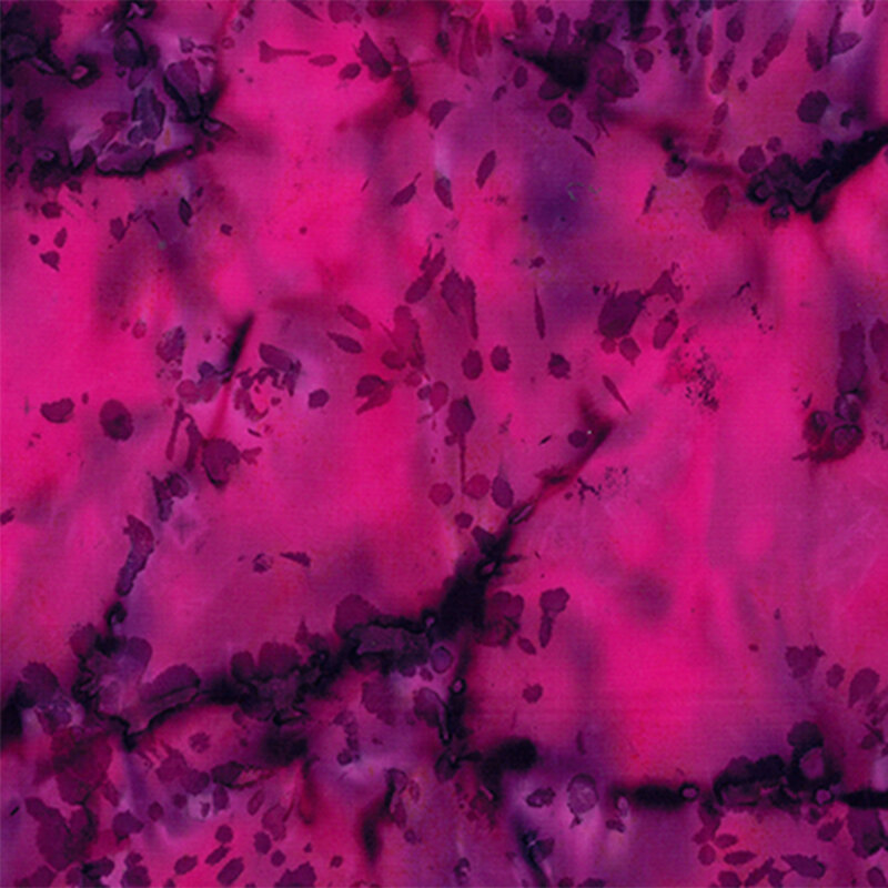 Abstract fabric pattern in shades of pink and purple with dark, irregular splotches and swirls.