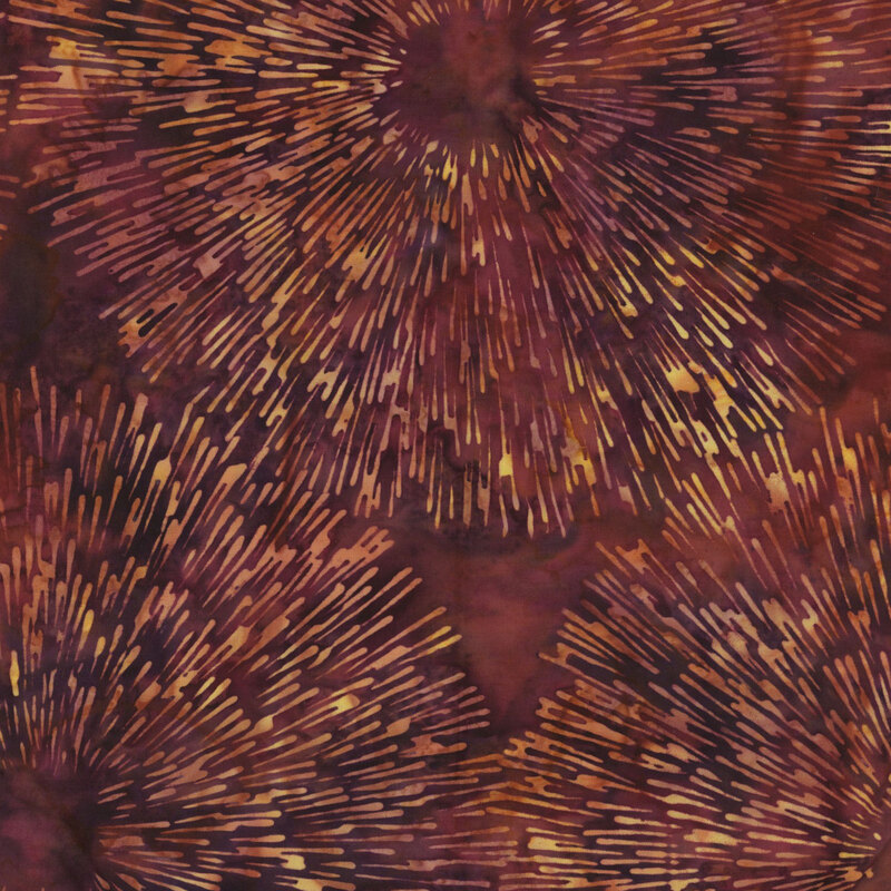 Fabric pattern featuring radiating lines in warm colors, resembling floral shapes on a dark background.