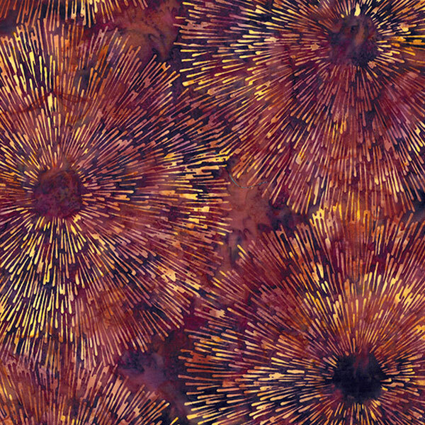 Fabric pattern featuring radiating lines in warm colors, resembling floral shapes on a dark background.