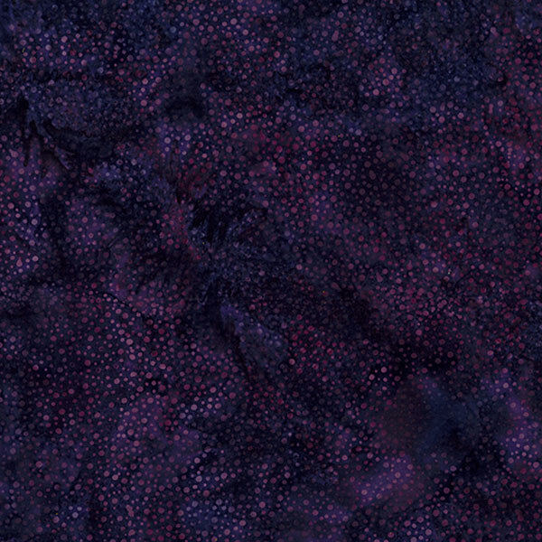 Dark textured fabric featuring a pattern of small, scattered dots in varying shades of purple and blue.