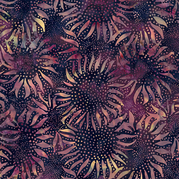 Abstract floral fabric with a dark background and colorful, stylized sunflowers.