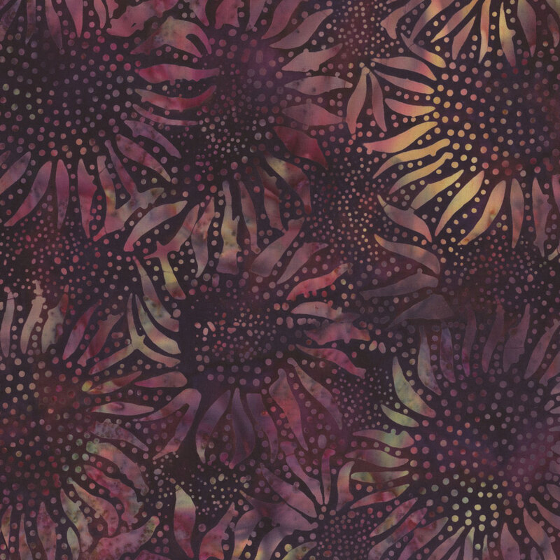 Abstract floral fabric with a dark background and colorful, stylized sunflowers.