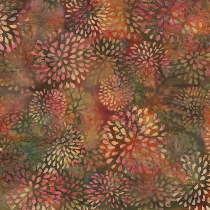 Mottled green, red, and orange batik with tonal and flax firework bursts.