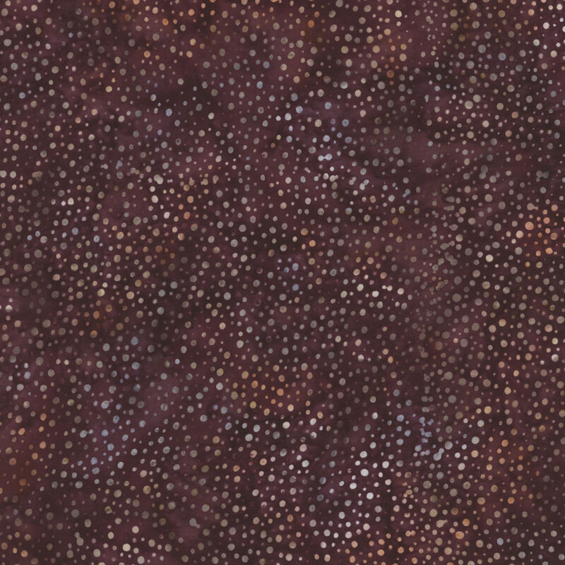 Rich, mottled mulberry batik fabric with a spray of multicolor dots.