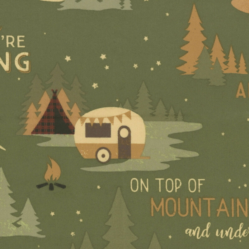 Green flannel with an illustration featuring a vintage camper, pine trees, mountains, and the text 
