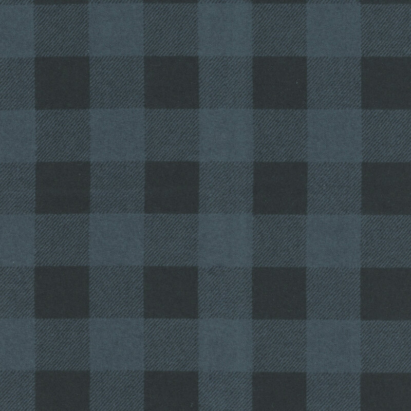 Dark plaid pattern with alternating squares of varying shades of blue and gray.