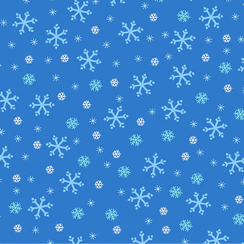 Medium blue fabric with tossed white, tonal blue, and cyan snowflake designs.