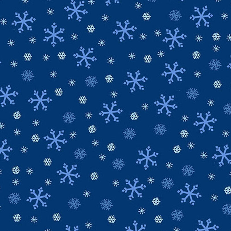 Midnight blue fabric with tossed white, tonal blue, and cyan snowflake designs.