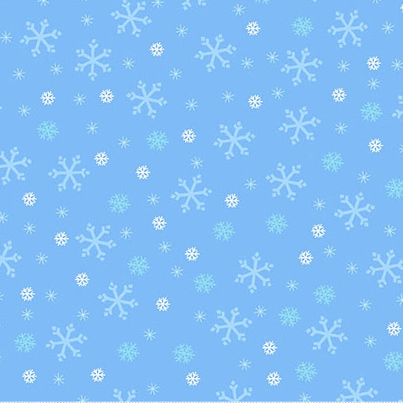 Light blue fabric with tossed white, tonal blue, and cyan snowflake designs.